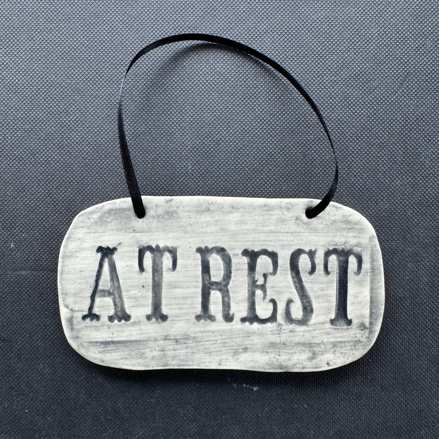 Handmade ceramic At Rest casket plaque wall hanging