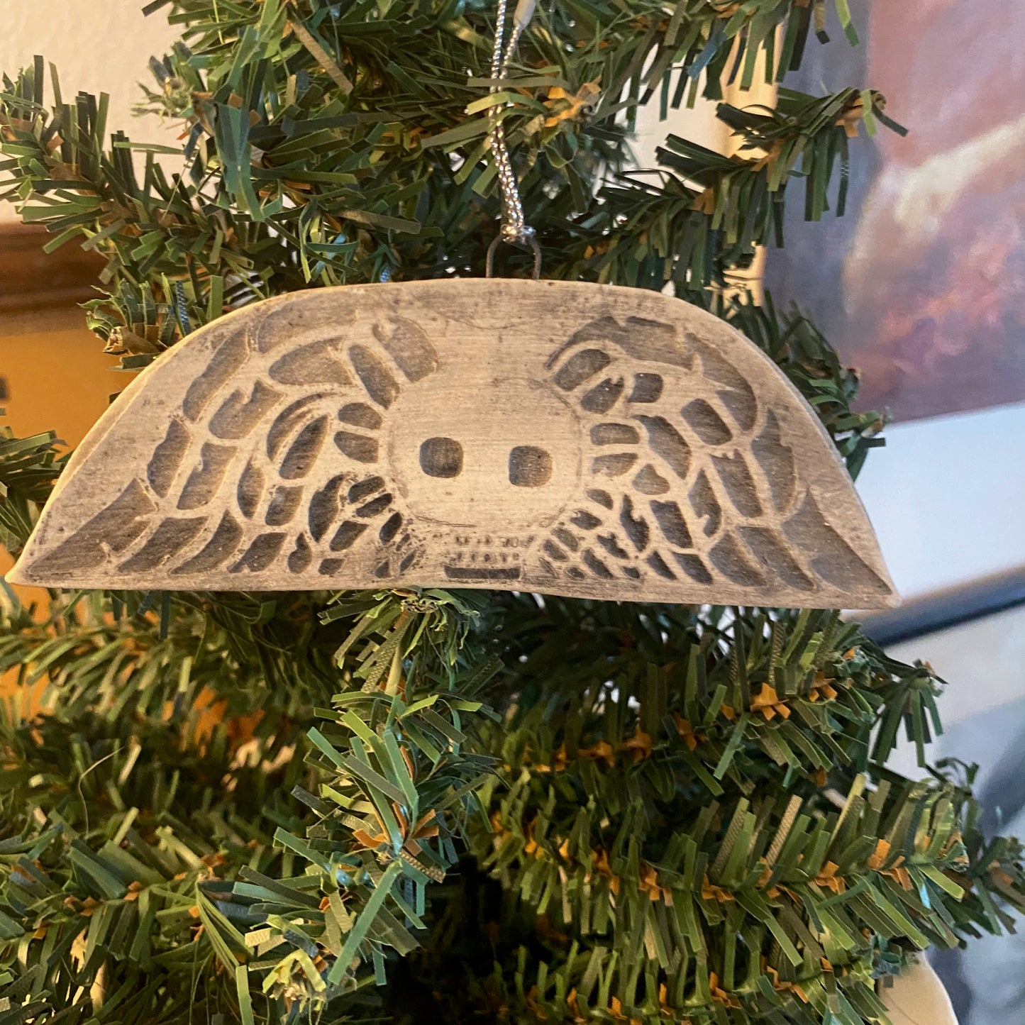 Handmade ceramic winged death's head ornament