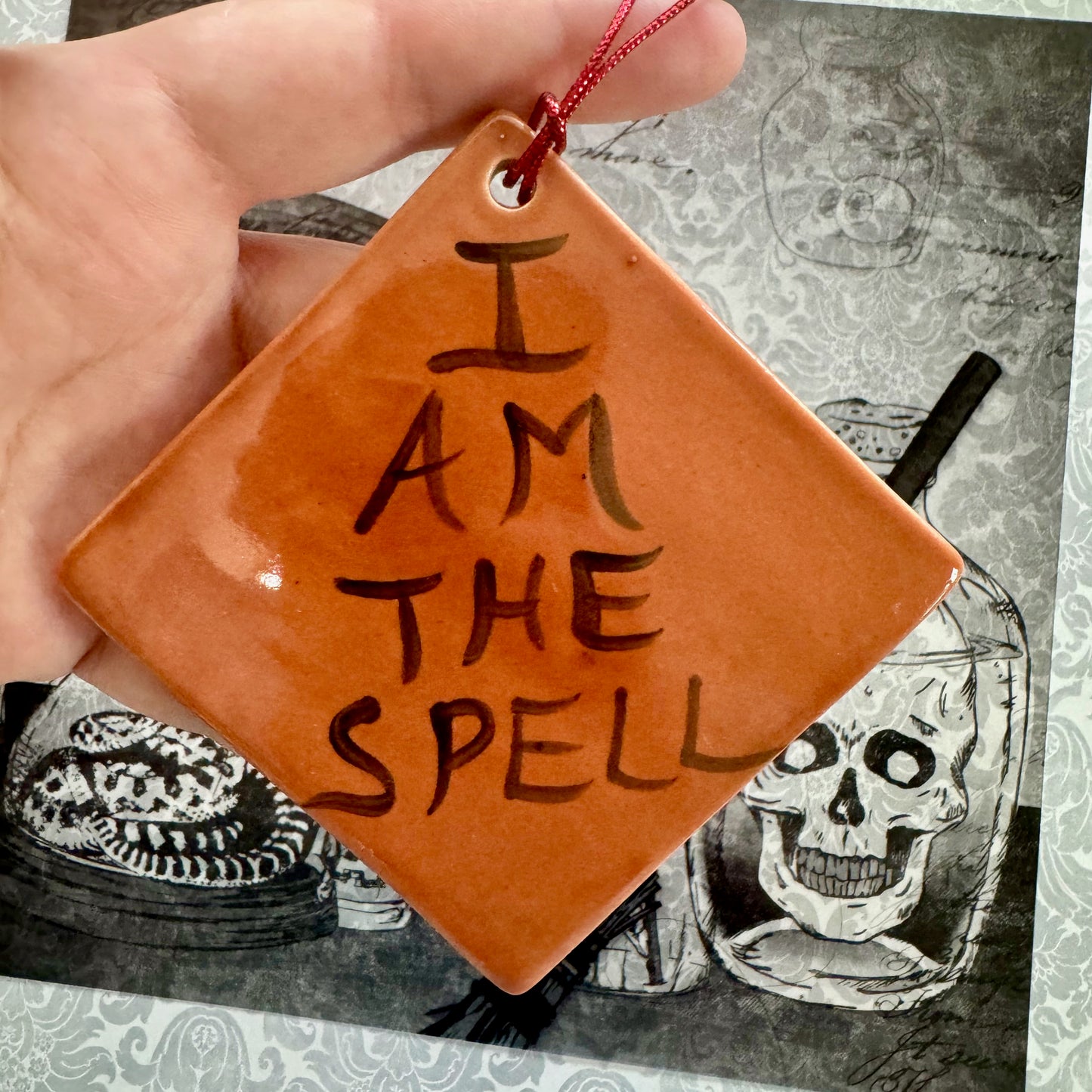 Handmade ceramic I Am the Spell wall hanging- burnt orange