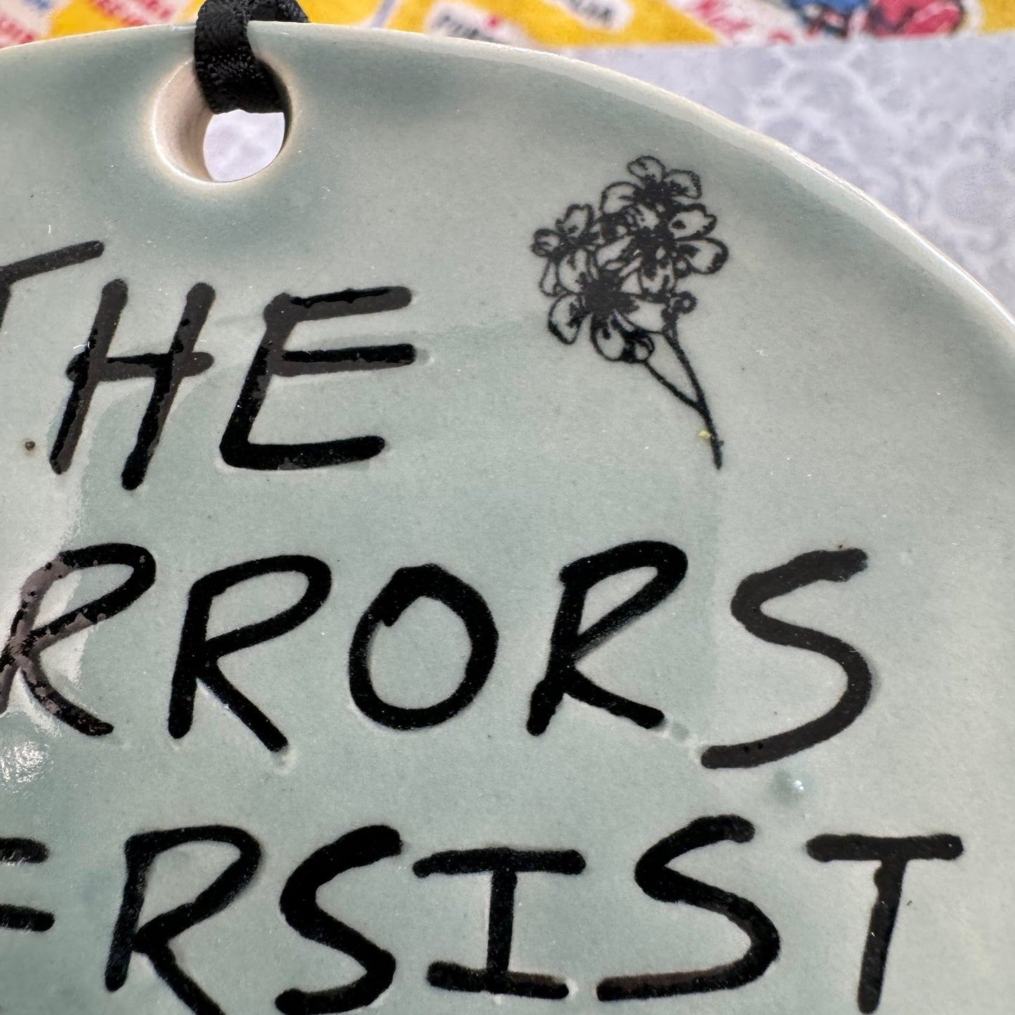 Handmade ceramic The Horrors Persist But So Do I wall hanging in blue grey