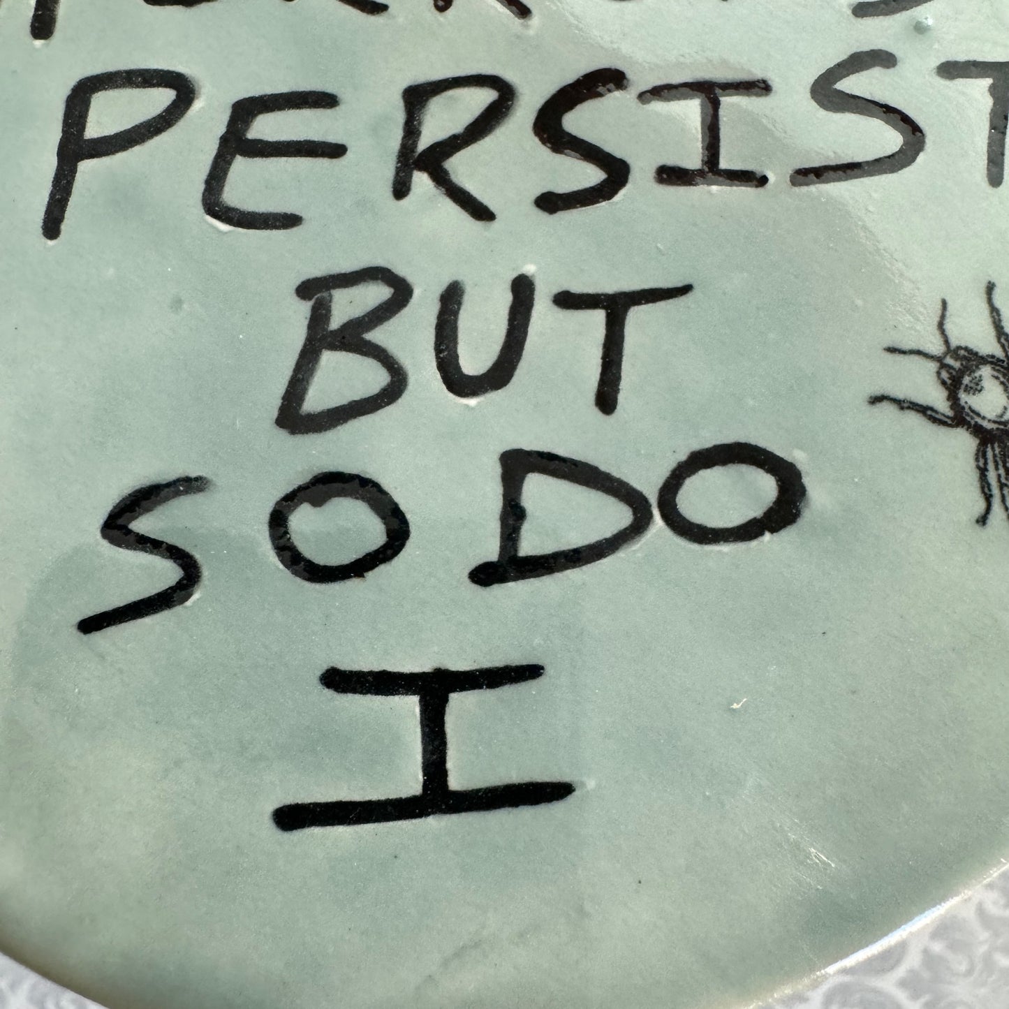 Handmade ceramic The Horrors Persist But So Do I wall hanging in blue grey