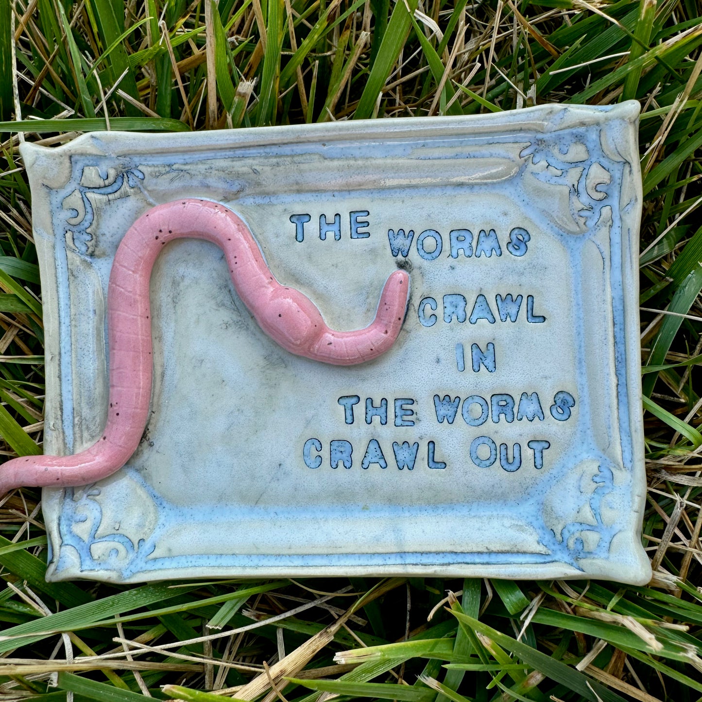 Handmade ceramic Worms Crawl In Worms Crawl Out trinket tray