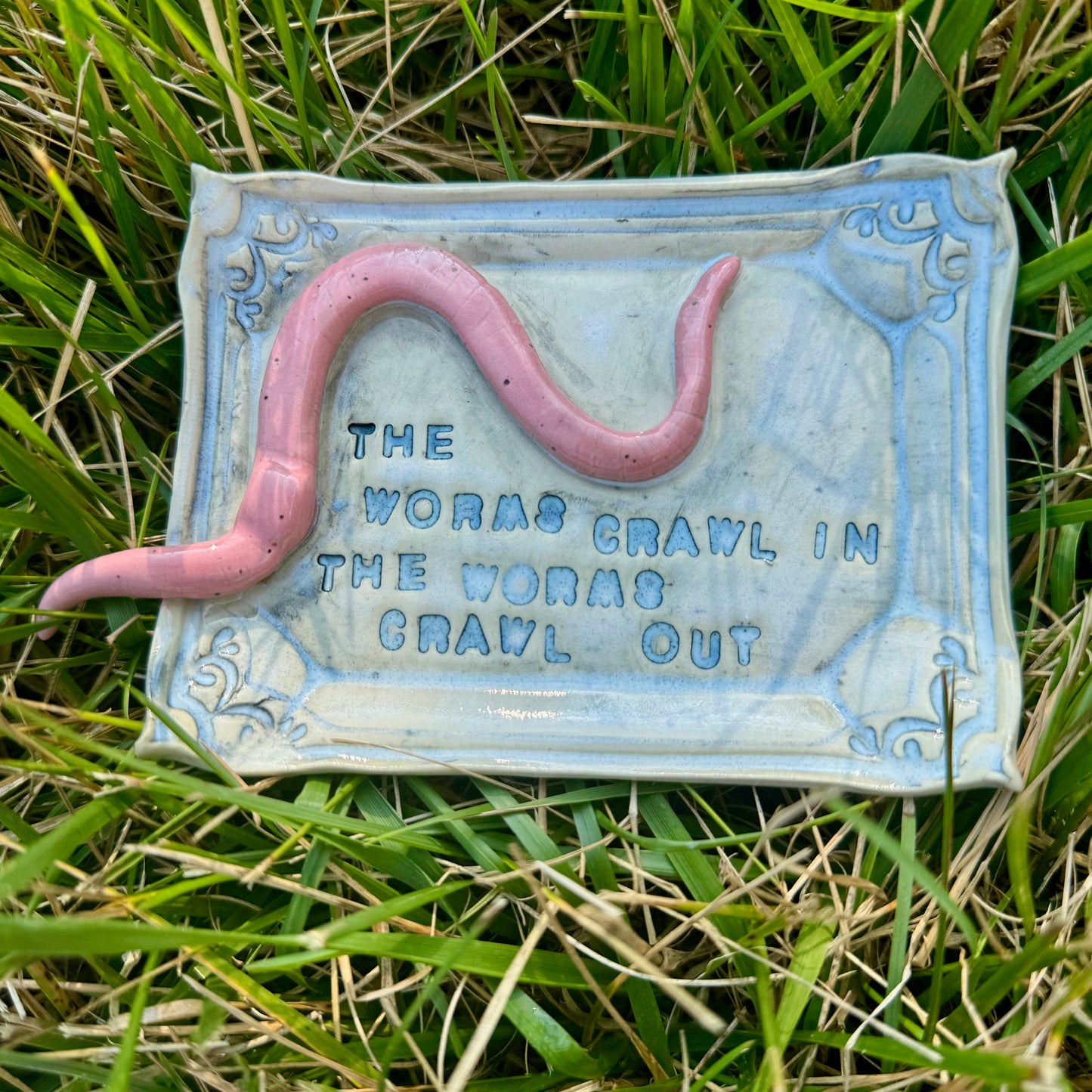 Handmade ceramic Worms Crawl In Worms Crawl Out trinket tray