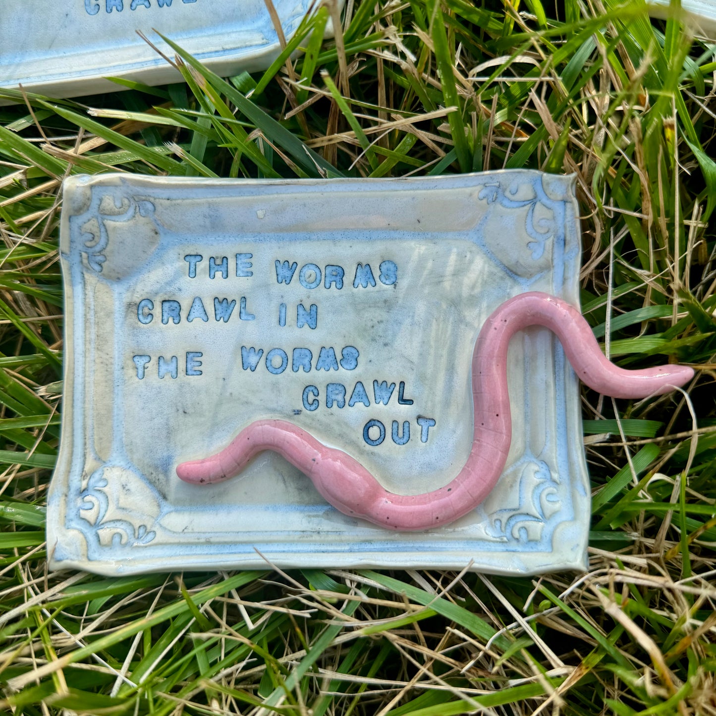 Handmade ceramic Worms Crawl In Worms Crawl Out trinket tray