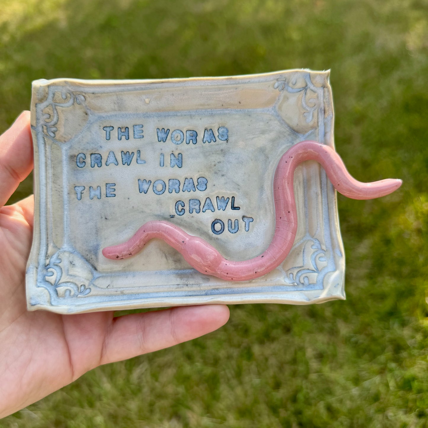 Handmade ceramic Worms Crawl In Worms Crawl Out trinket tray