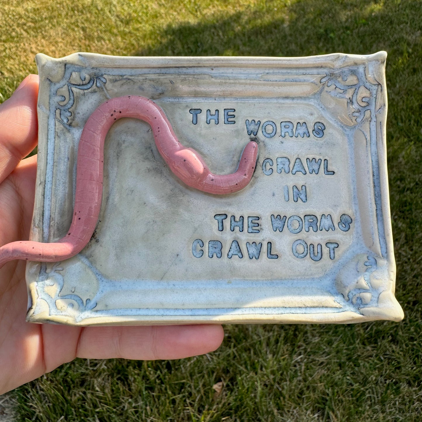 Handmade ceramic Worms Crawl In Worms Crawl Out trinket tray