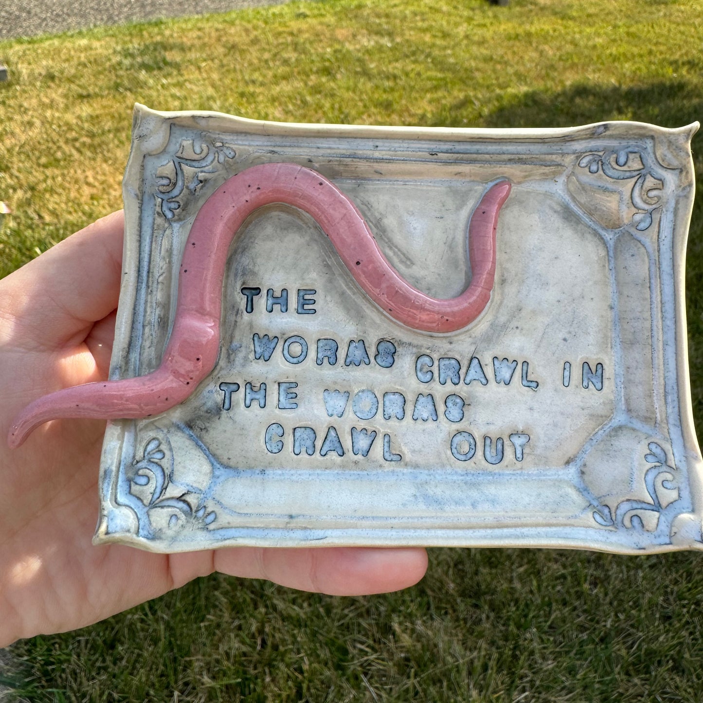 Handmade ceramic Worms Crawl In Worms Crawl Out trinket tray