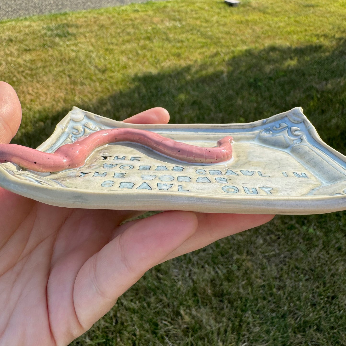 Handmade ceramic Worms Crawl In Worms Crawl Out trinket tray