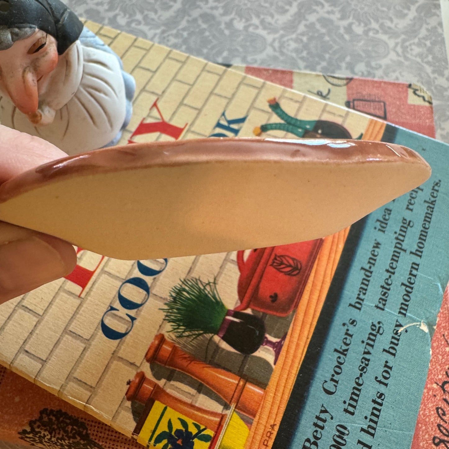 Handmade ceramic Kitchen Witch spoon rest - red orange
