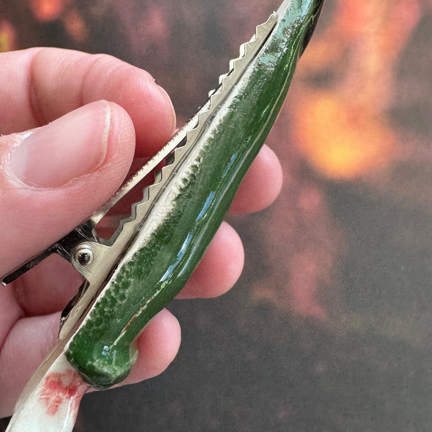 Handmade ceramic green monster finger hair clip