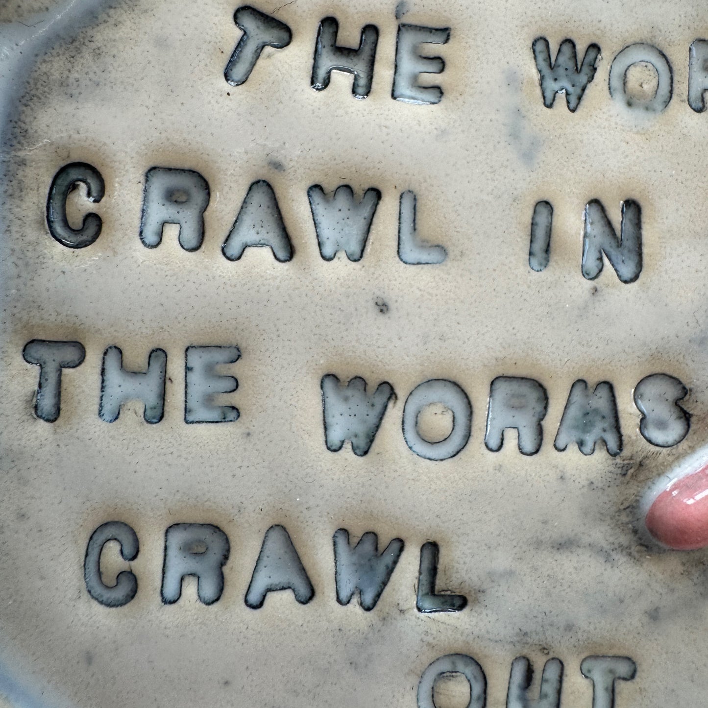 Handmade ceramic Worms Crawl In Worms Crawl Out curio trinket tray