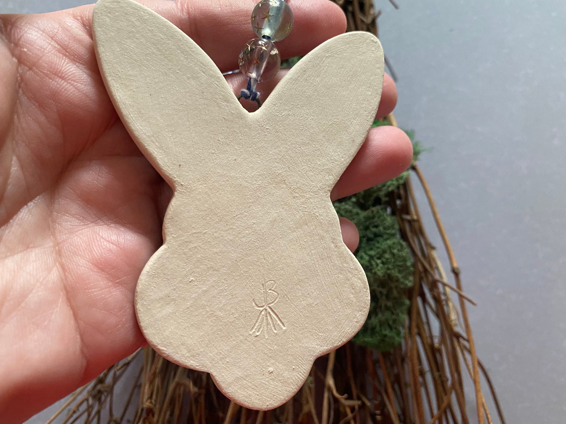 Handmade ceramic rabbit ornament. Ostara decoration. Easter bunny ornament. Blue white speckled Easter wall hanging. Year of the Rabbit gift