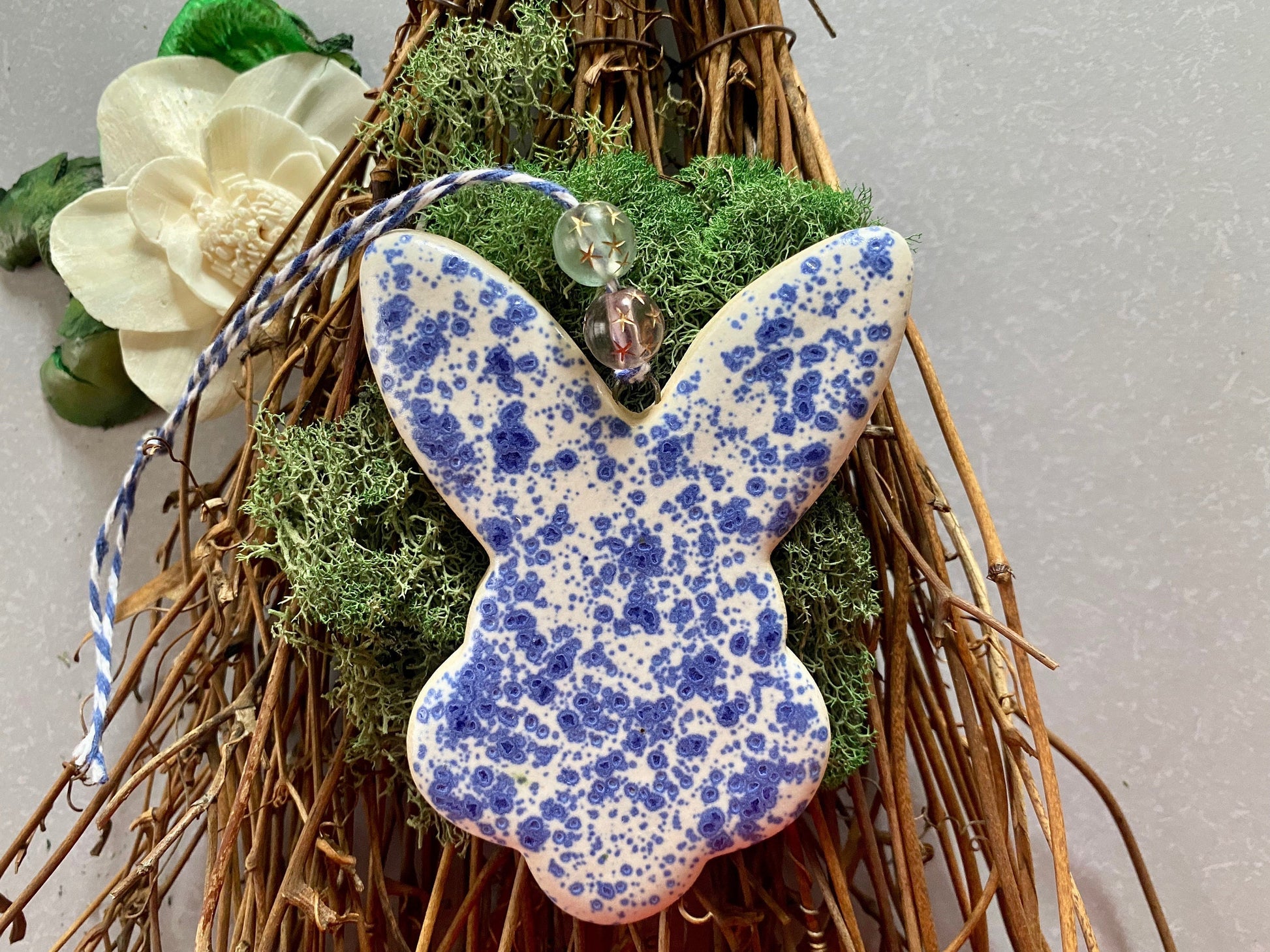 Handmade ceramic rabbit ornament. Ostara decoration. Easter bunny ornament. Blue white speckled Easter wall hanging. Year of the Rabbit gift