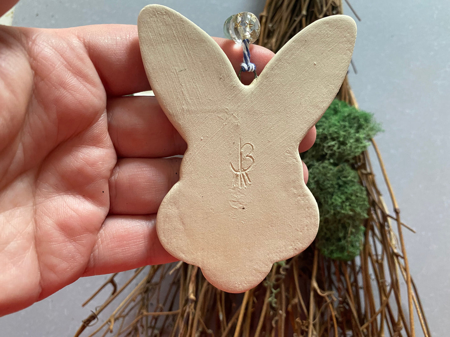 Handmade ceramic rabbit ornament. Ostara decoration. Easter bunny ornament. Blue white speckled Easter wall hanging. Year of the Rabbit gift