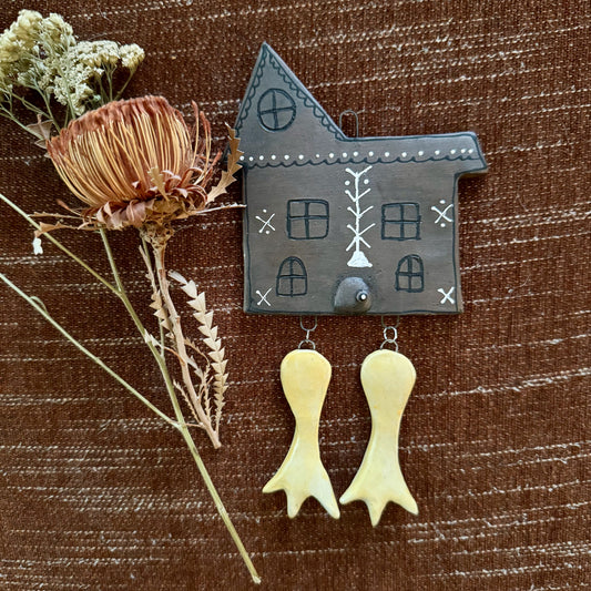 Ceramic Baba Yaga's hut wall hanging