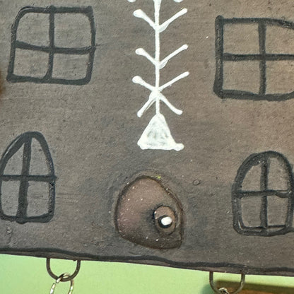 Ceramic Baba Yaga's hut wall hanging