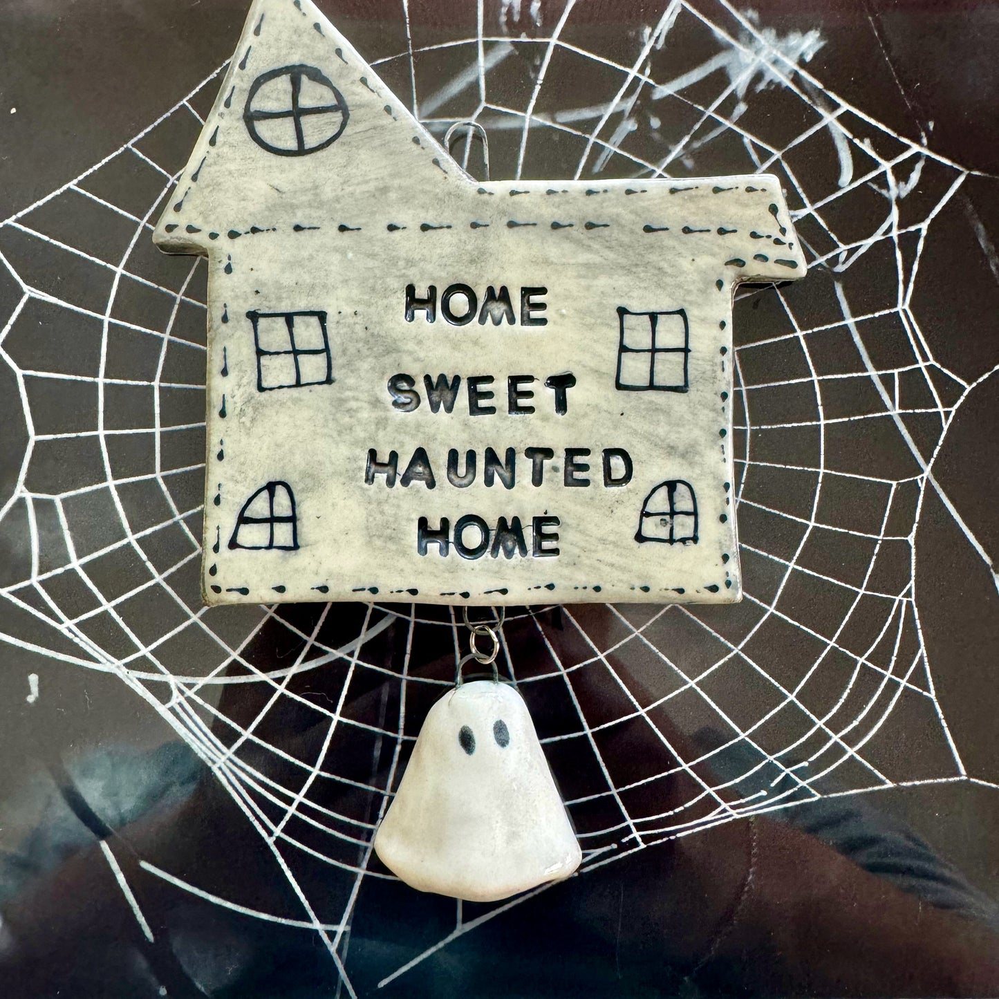 Handmade ceramic Home Sweet Haunted Home wall hanging