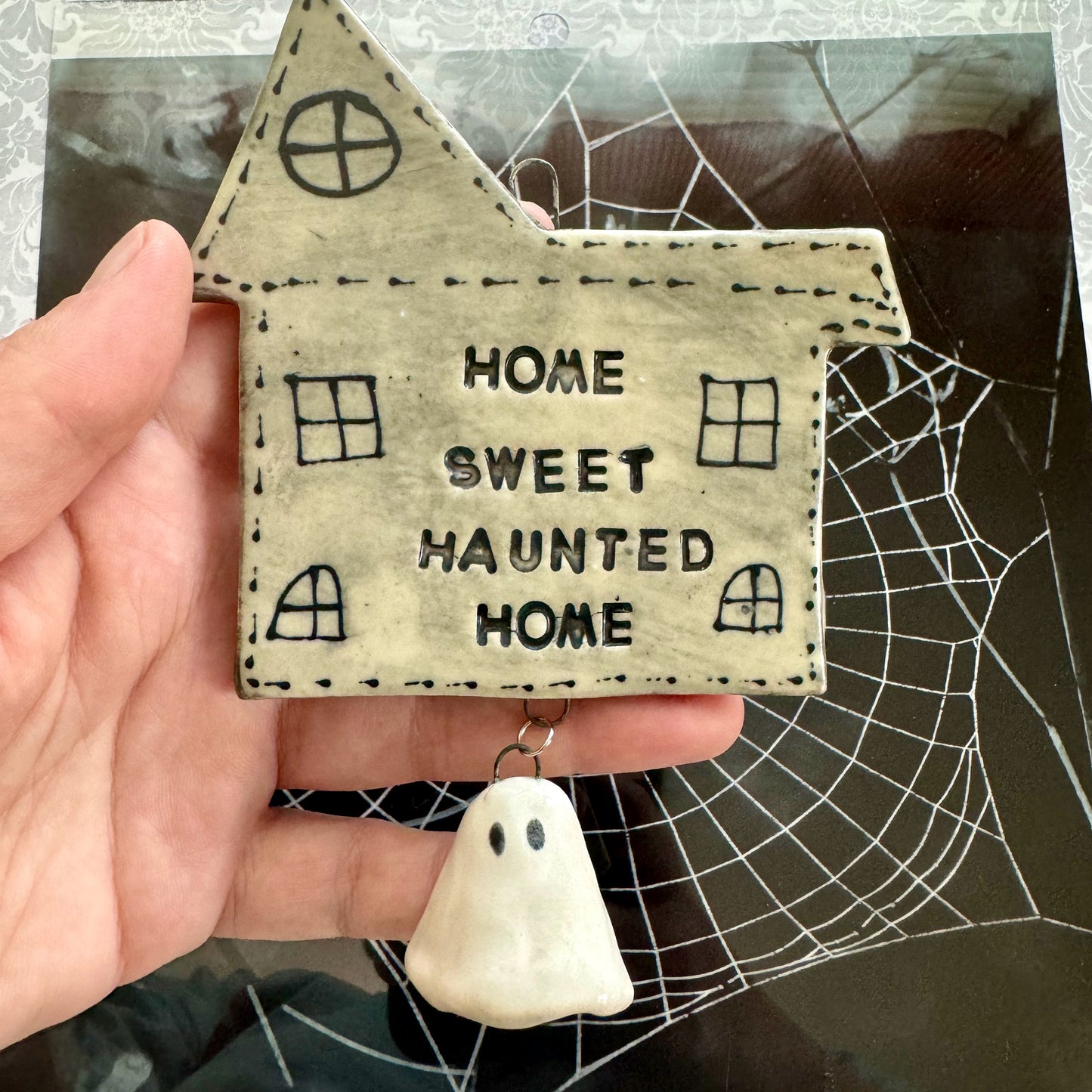 Handmade ceramic Home Sweet Haunted Home wall hanging