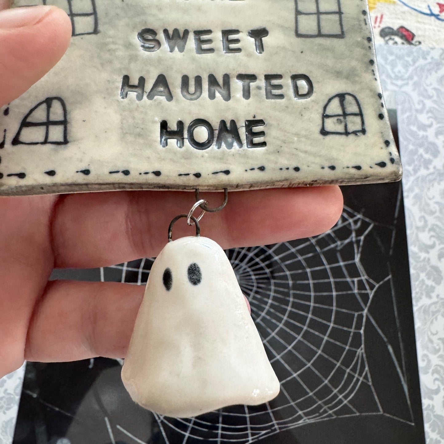 Handmade ceramic Home Sweet Haunted Home wall hanging