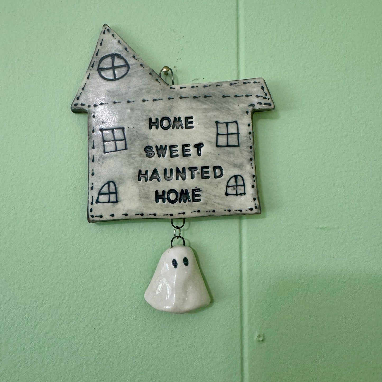 Handmade ceramic Home Sweet Haunted Home wall hanging