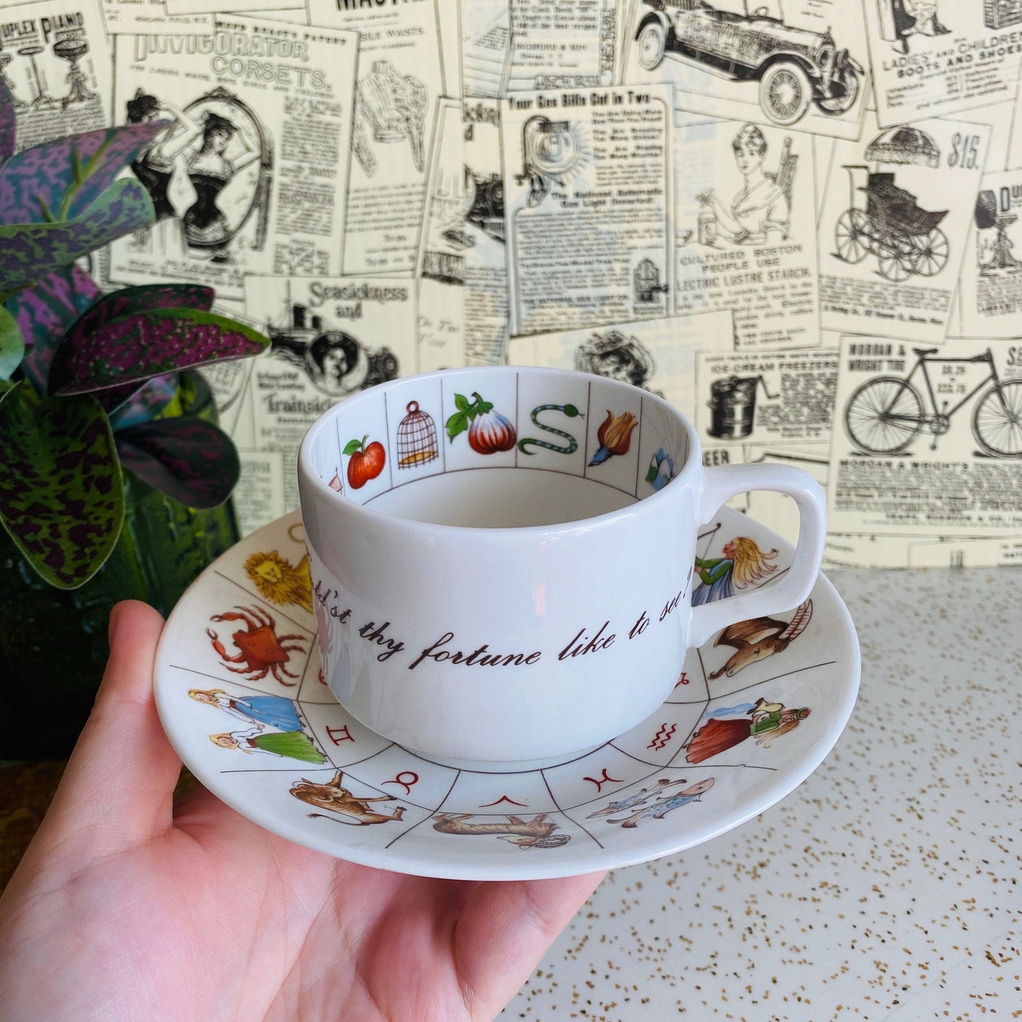 Vintage Royal Kendal fortune telling teacup. Colorful tea cup and saucer set for tea leaf reading with astrology and zodiac symbols design.