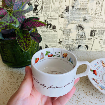 Vintage Royal Kendal fortune telling teacup. Colorful tea cup and saucer set for tea leaf reading with astrology and zodiac symbols design.