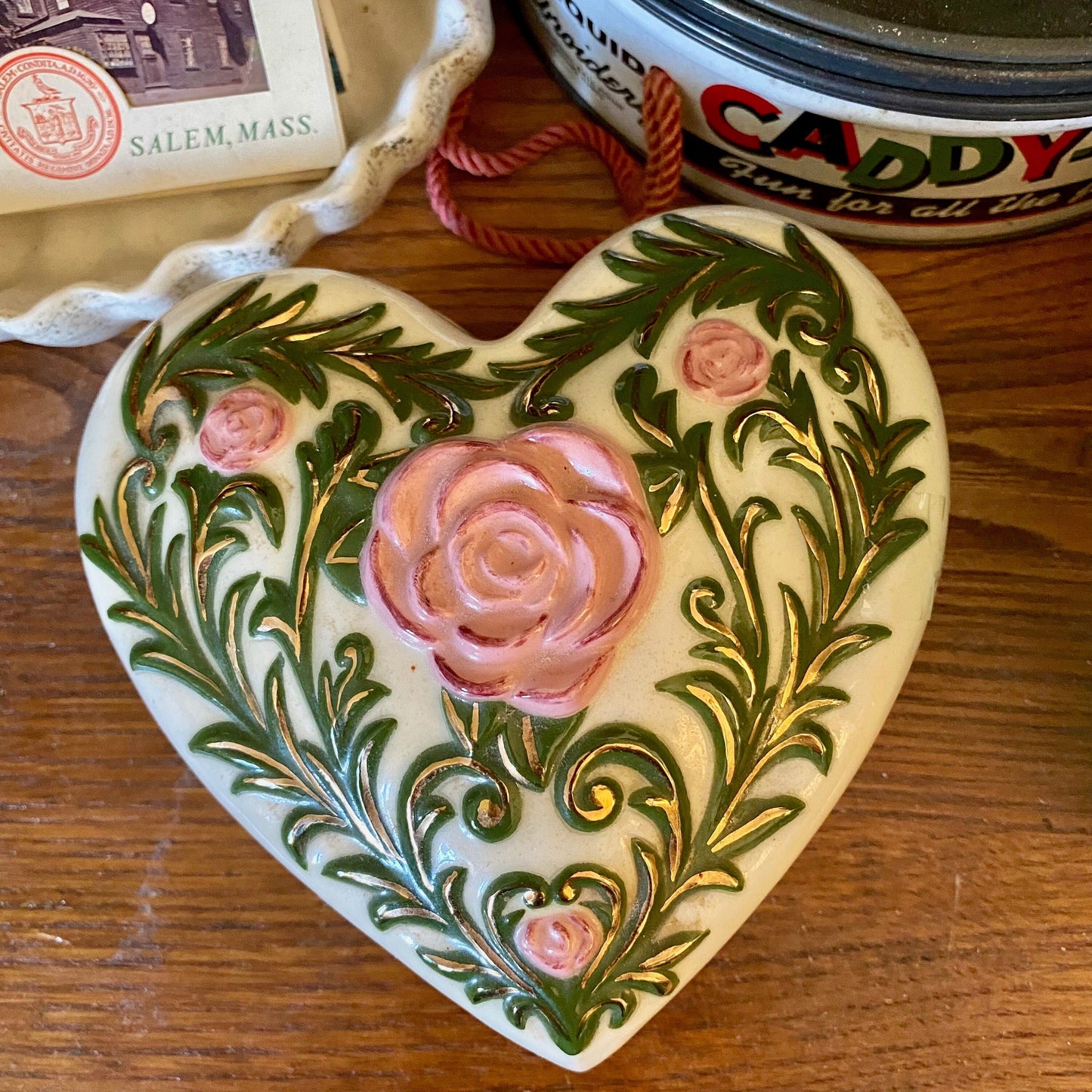 Vintage rose heart shaped box. Pretty ceramic porcelain trinket jewelry box with pink and green floral design. Victorian romantic home decor