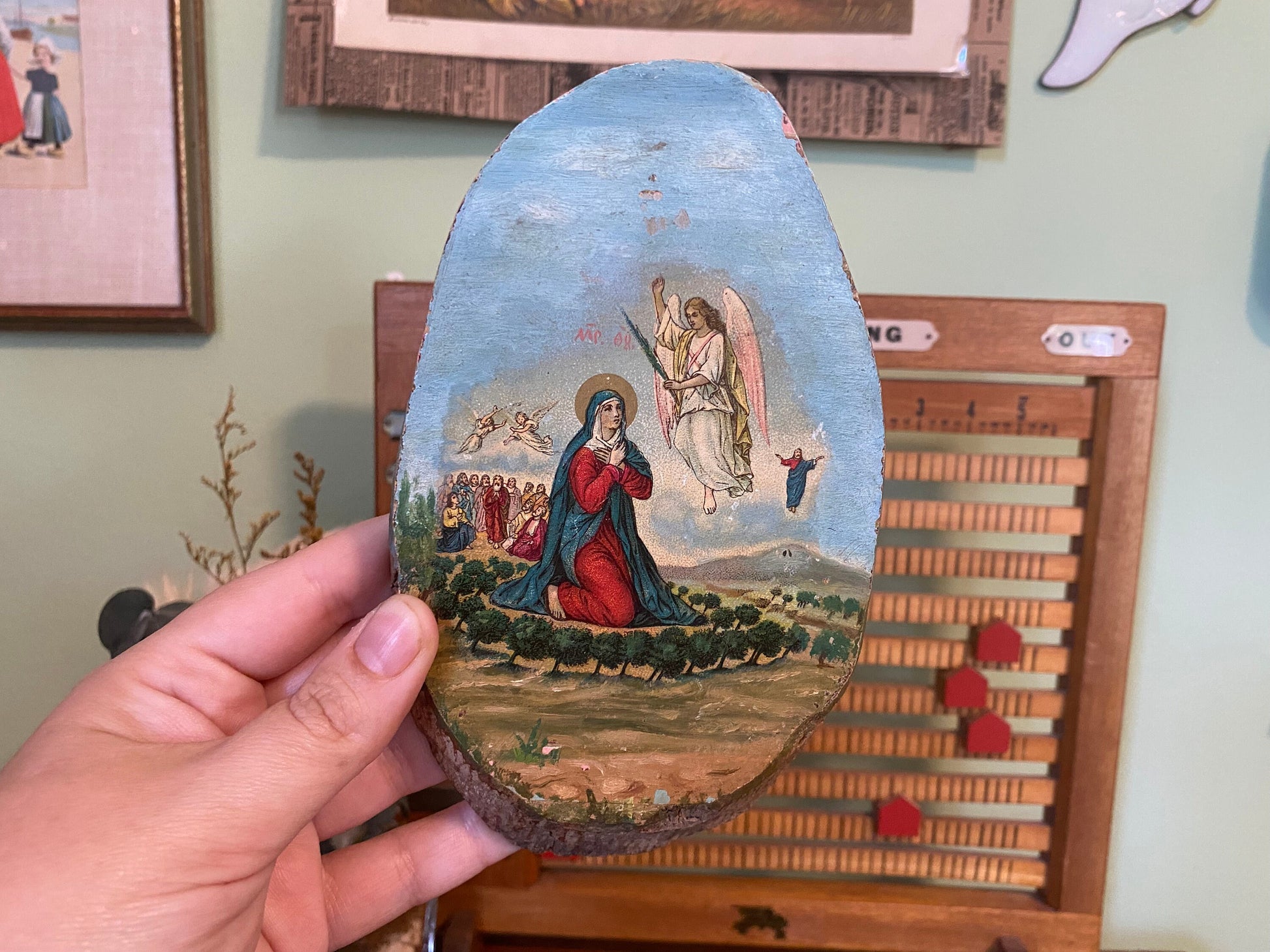 Vintage religious wood slice art with depiction of the Virgin Mary and the Ascension of Jesus on real rustic wood. Catholic home decor.