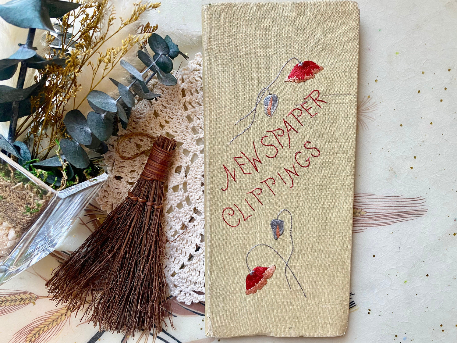 Antique Victorian handmade newspaper clippings book with floral embroidered fabric cover. One of a kind Victorian scrapbook keepsake album.