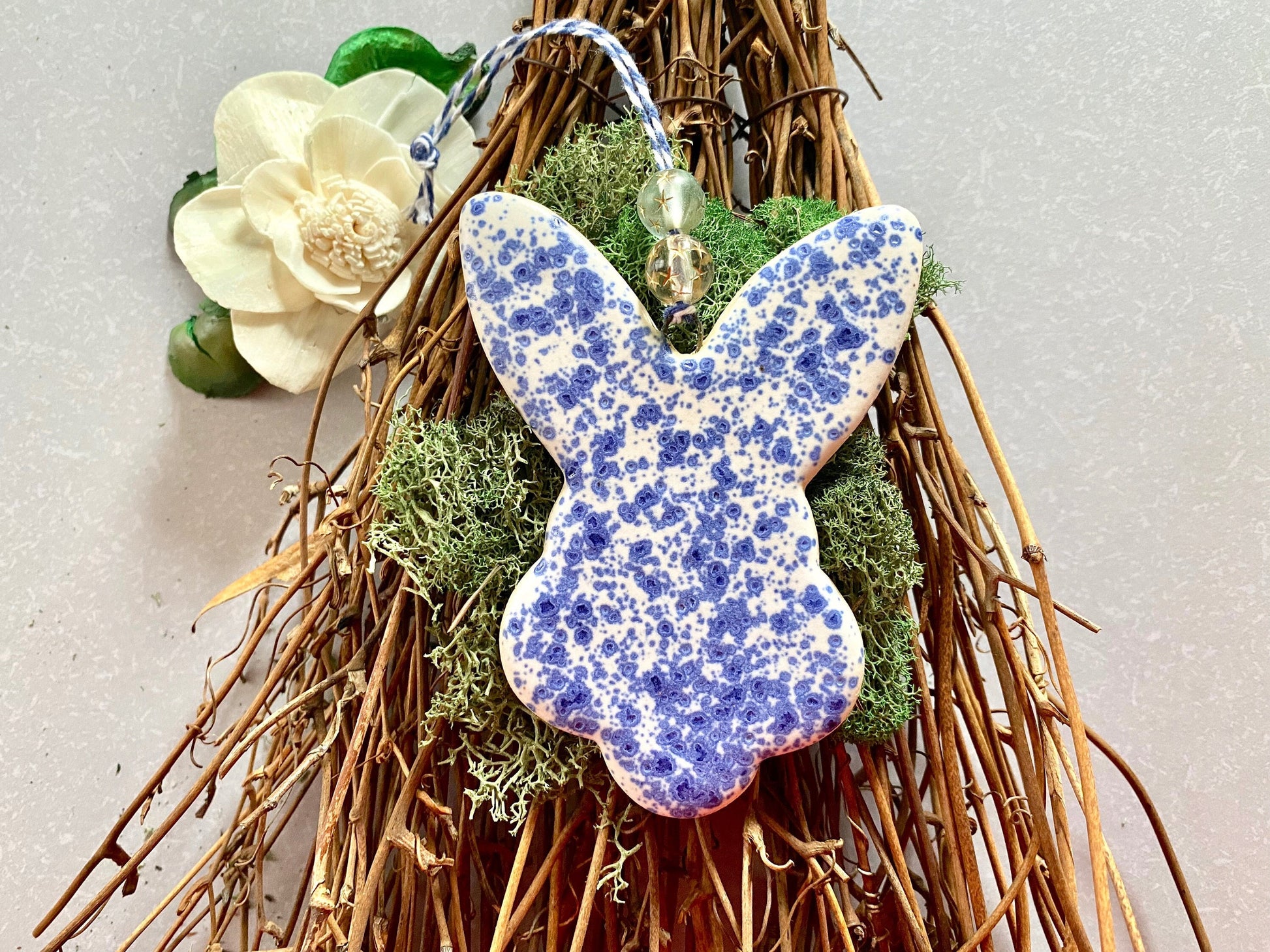 Handmade ceramic rabbit ornament. Ostara decoration. Easter bunny ornament. Blue white speckled Easter wall hanging. Year of the Rabbit gift