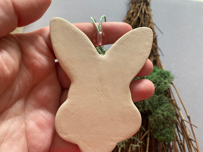 Handmade ceramic rabbit ornament. Ostara decoration. Easter bunny ornament. White green speckle Easter wall hanging. Year of the Rabbit gift